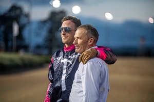 Trainer David Aiken with his son Josh following one of their NSW feature wins.